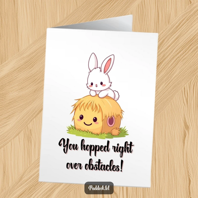 Funny free printable congratulations card with a fluffy bunny hopping over a tiny, smiling hay bale, cheering your success.