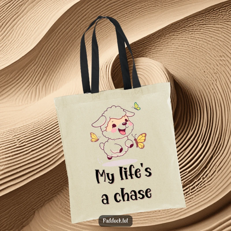 Funny Sheepdog Chase Tote Bag: A charming tote featuring a sheepdog energetically chasing a butterfly, bringing doggy delight everywhere.